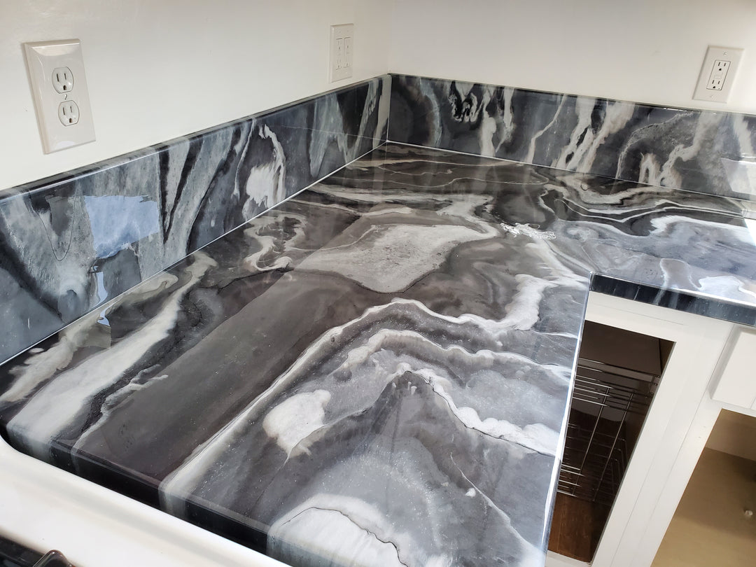 Marble-patterned epoxy kitchen countertop with backsplash